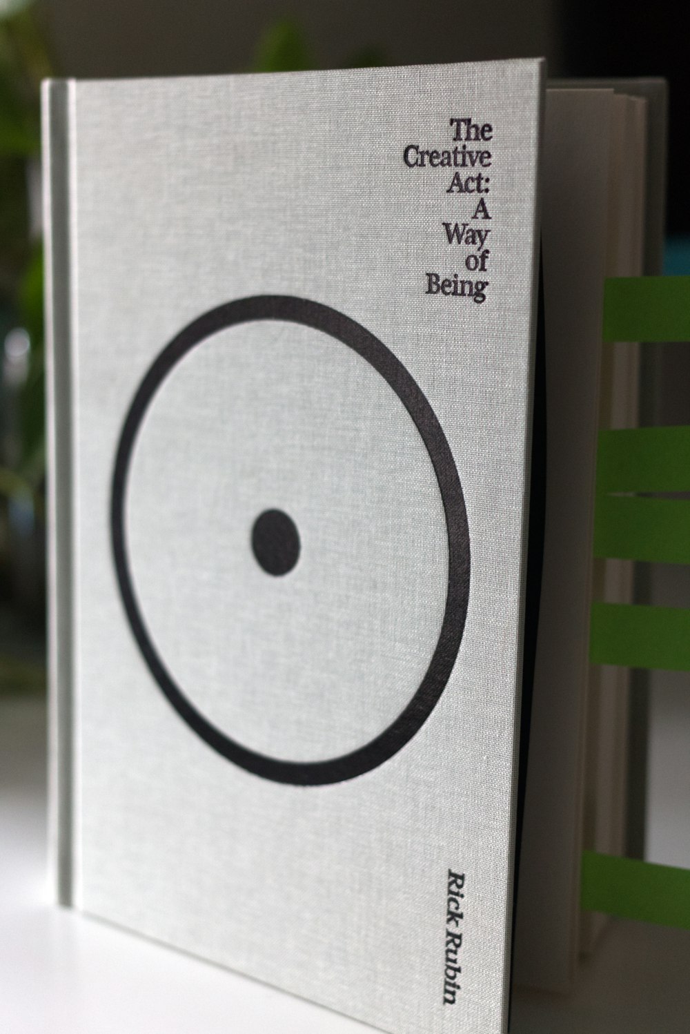 a book sitting on top of a white table