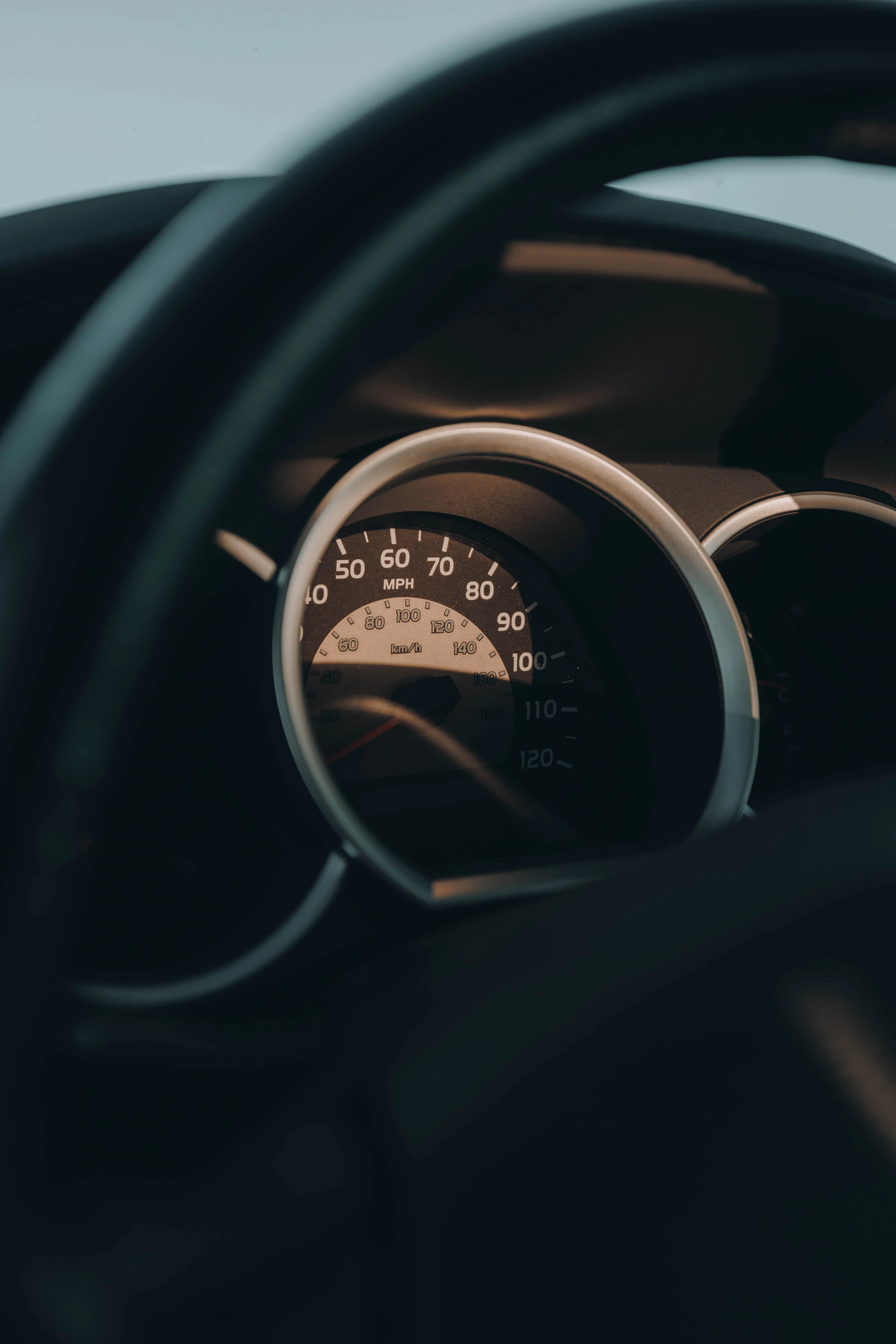 a close up of a speedometer in a car