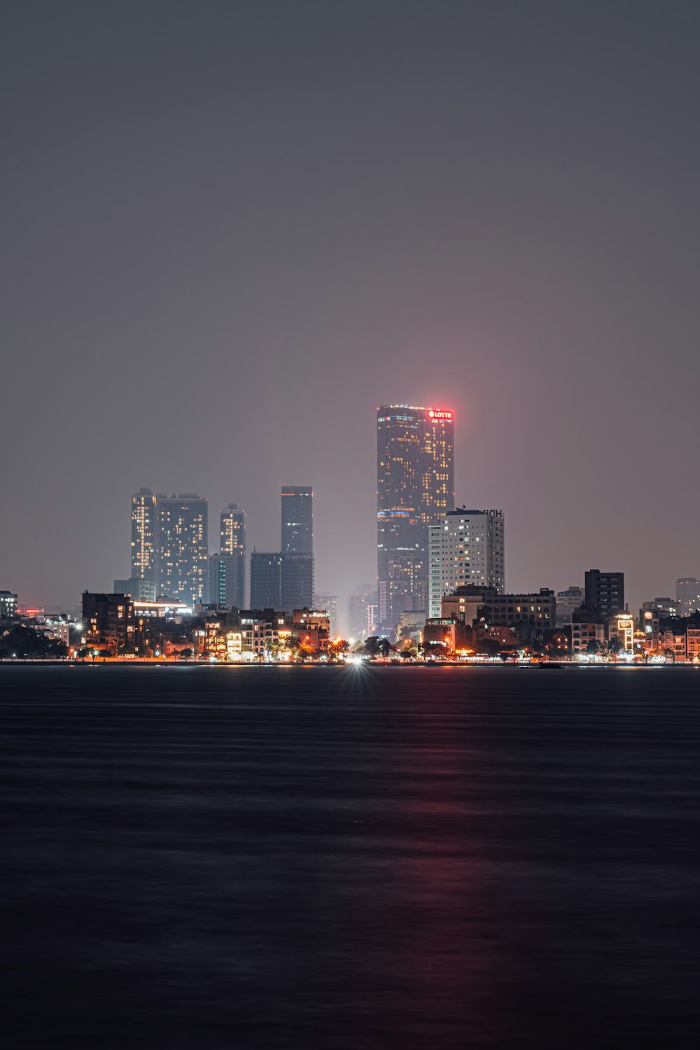 a view of a city at night from across the water