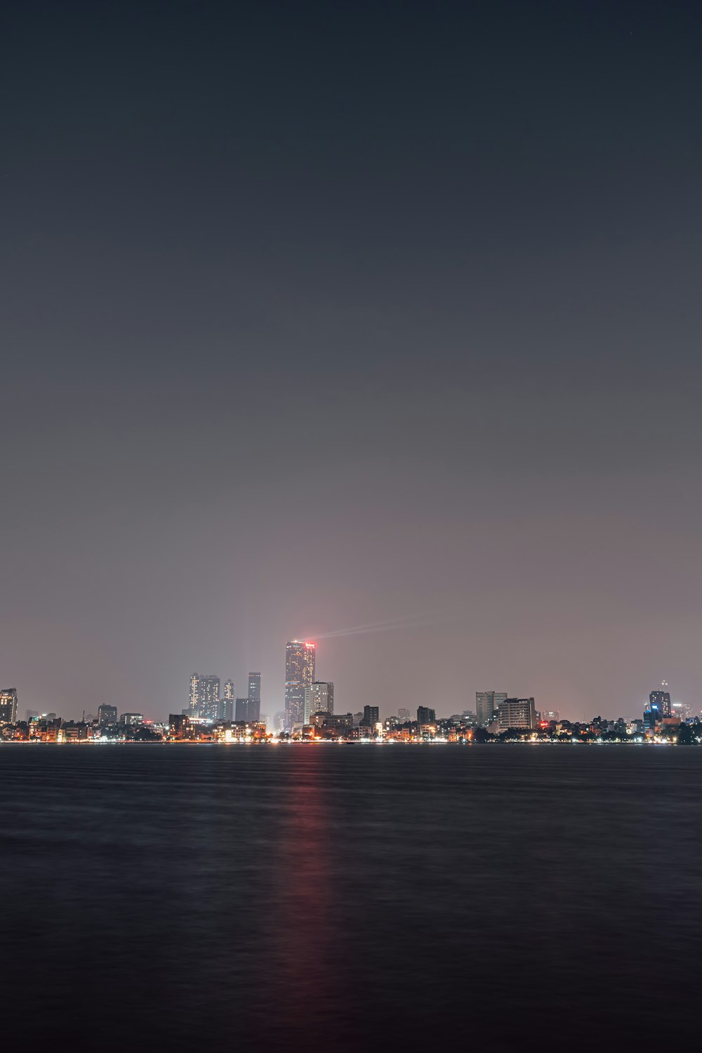 a view of a city at night from across the water