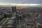An aerial view of an urban skyline with skyscrapers, symbolizing growth and technology.