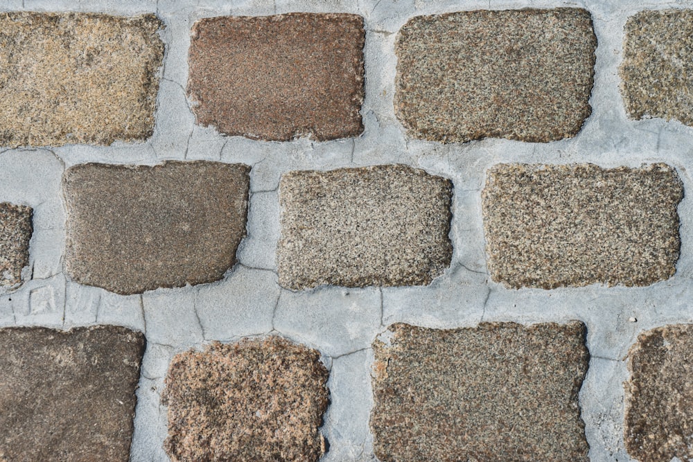 a close up of a brick wall made of stones