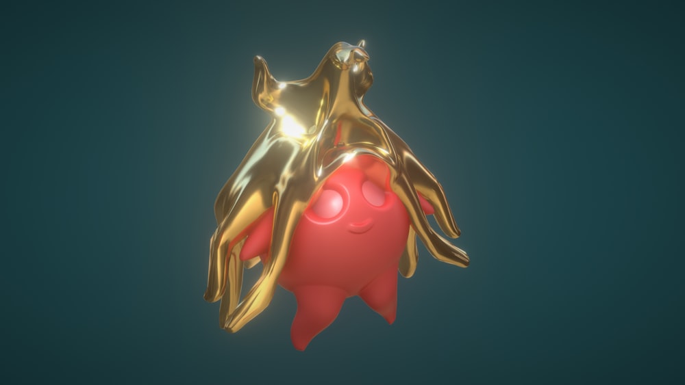 a gold and red object floating in the air