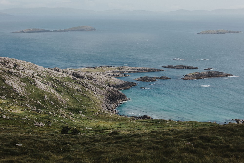 a view of a body of water from a hill