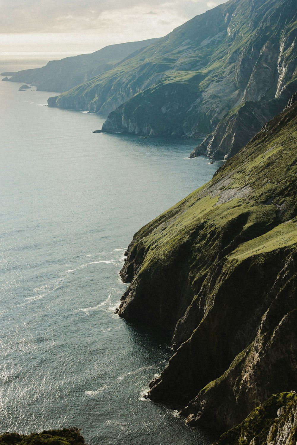 a large body of water surrounded by mountains