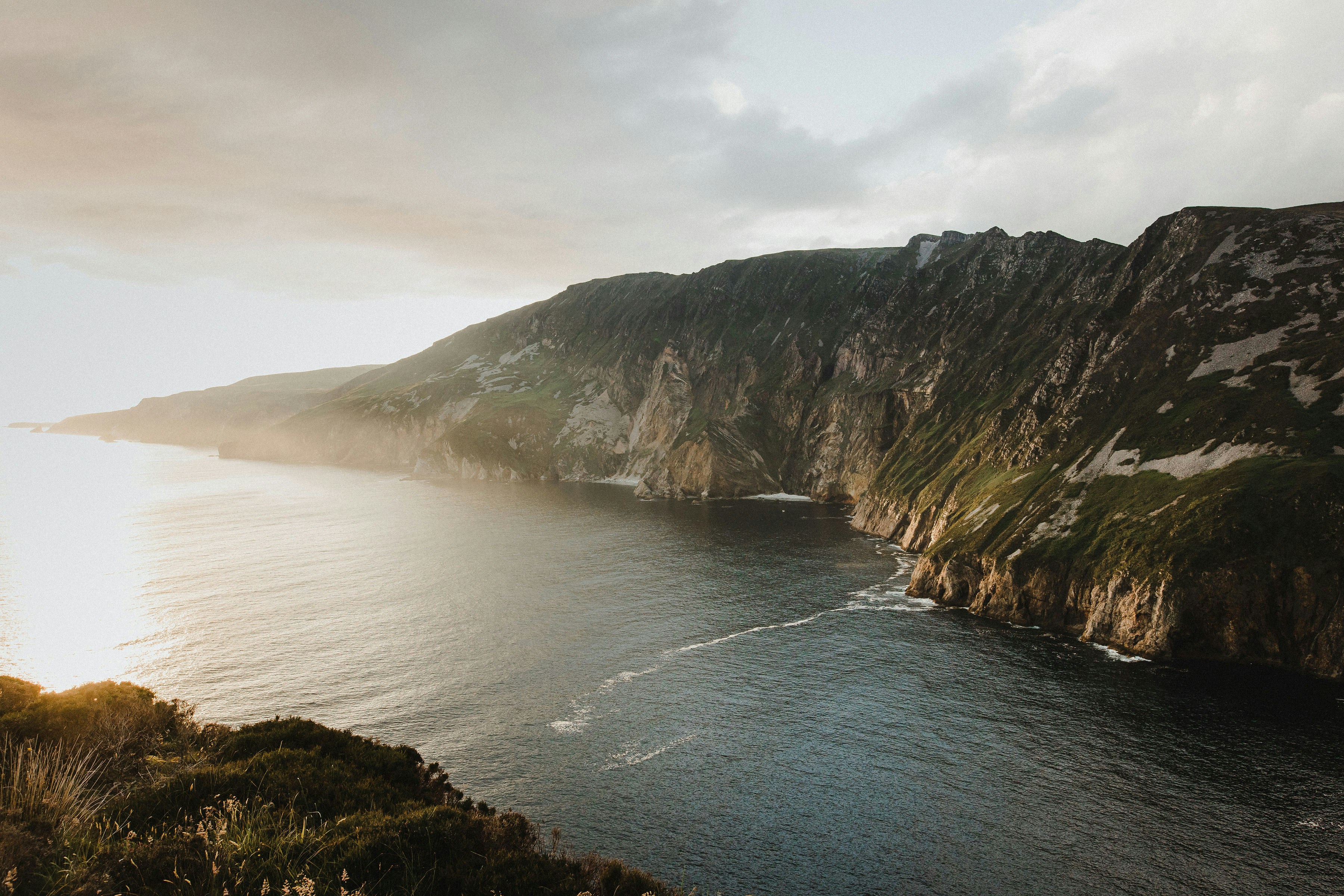 a large body of water surrounded by mountains