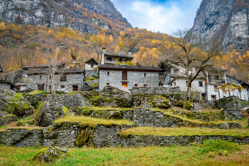 an old stone house in a mountainous area