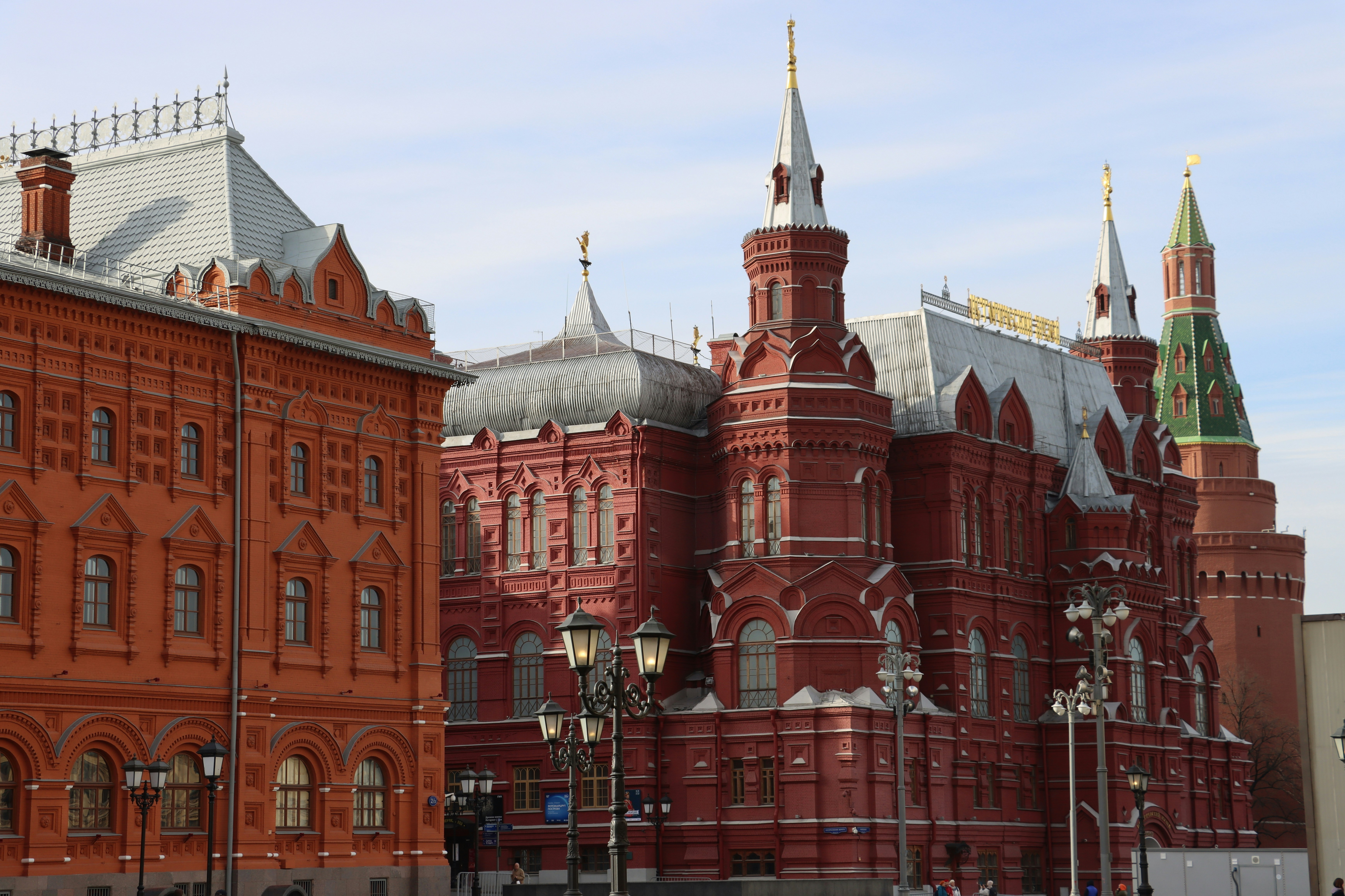 a large red building with two towers on top of it