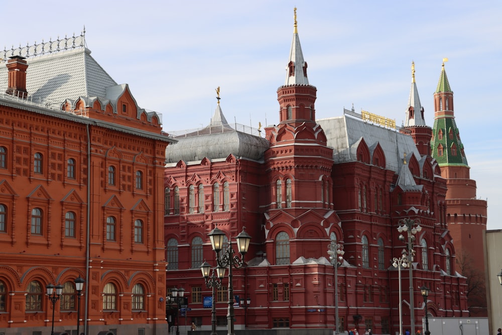 a large red building with two towers on top of it