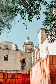 an old building with a clock tower on top of it