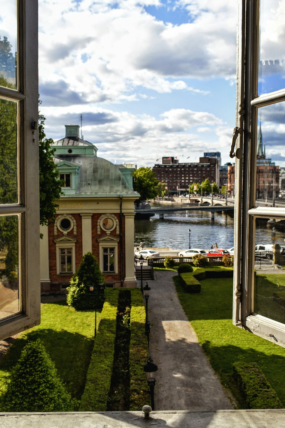 a view of a river from a window of a building