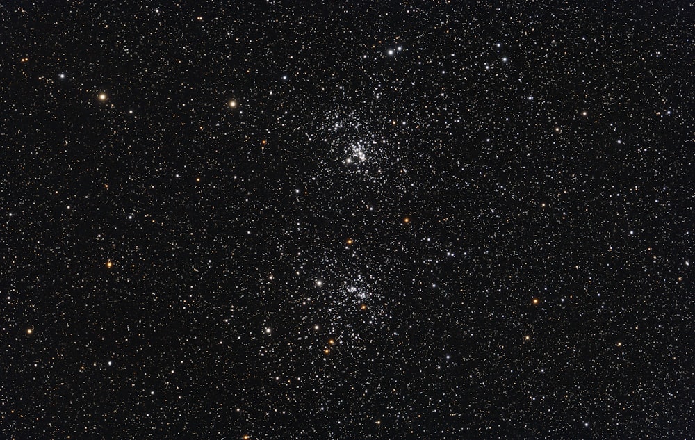 a cluster of stars in the night sky