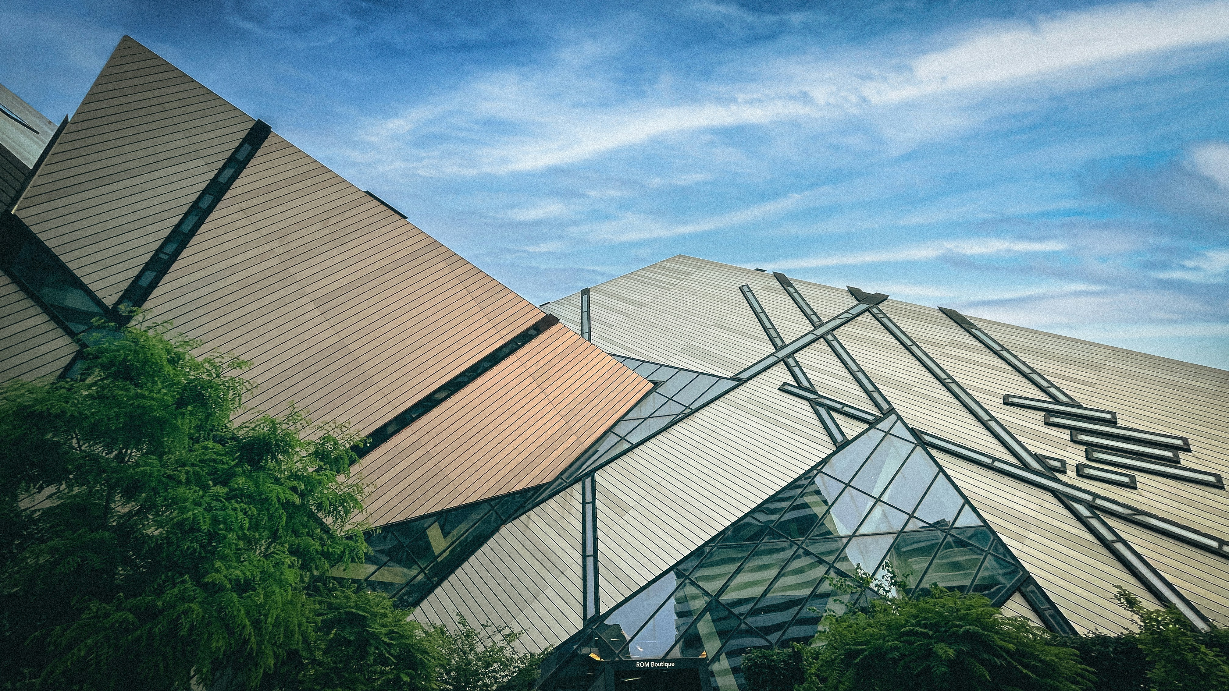 a building with a large triangular design on it's side
