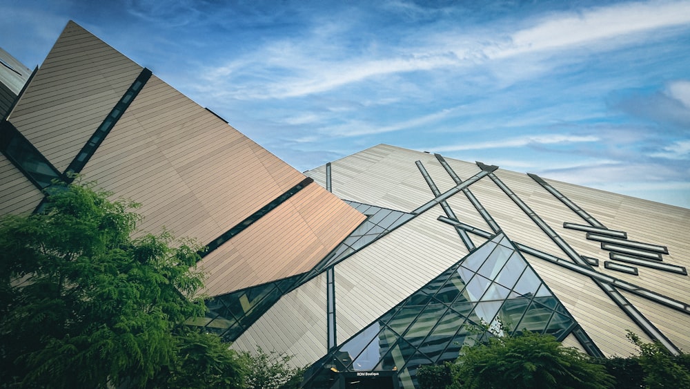 a building with a large triangular design on it's side