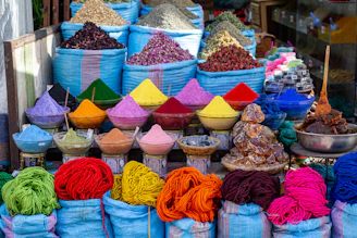 a bunch of bags filled with different colored items