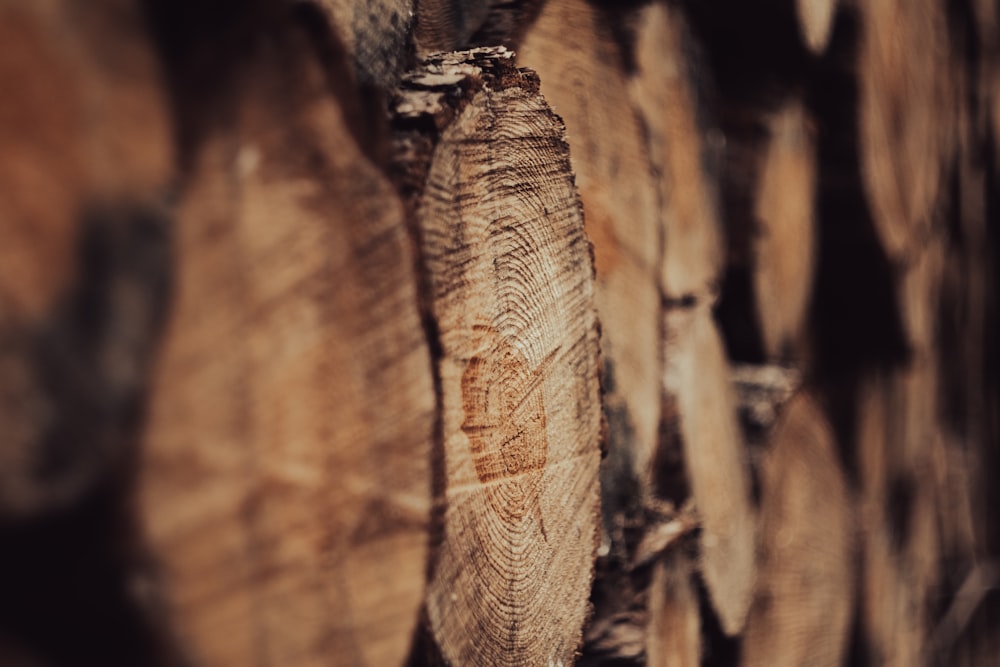 a close up of a stack of logs