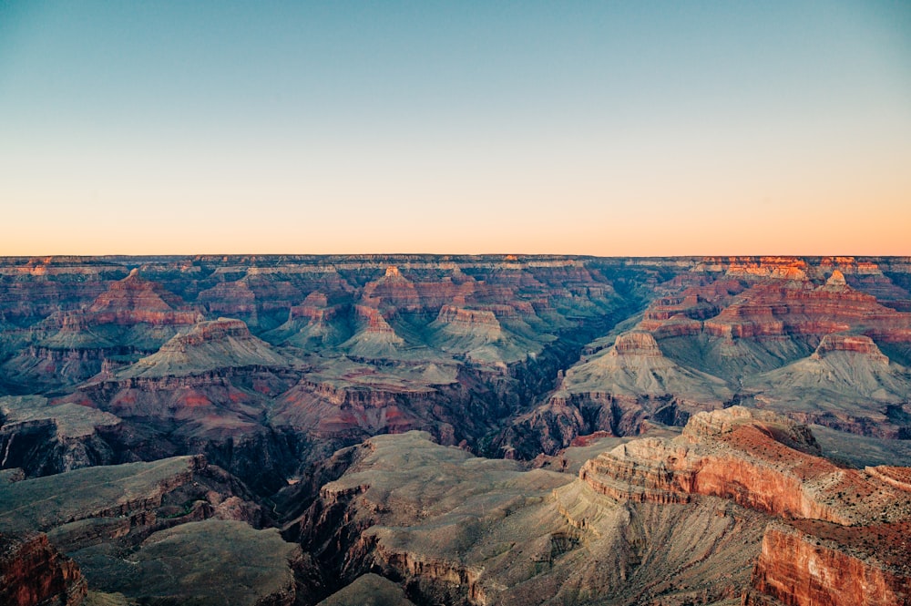 a scenic view of the grand canyon at sunset