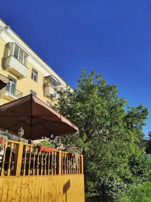 A bright balcony covered with sturdy UPVC panels on a sunny day.