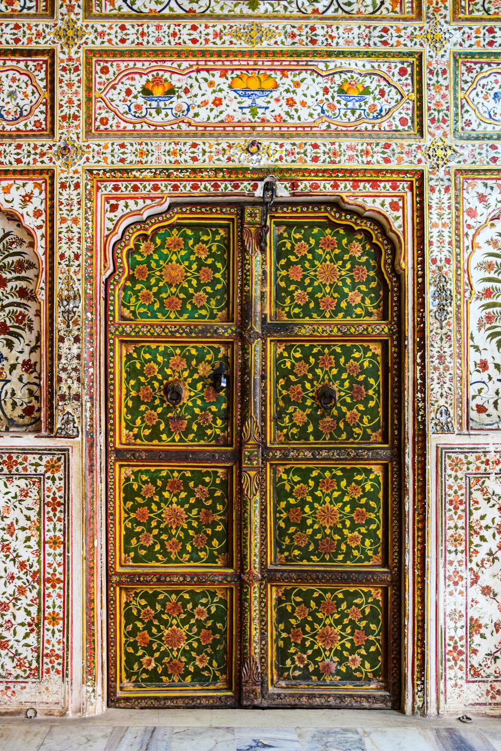 an ornately decorated door in a building