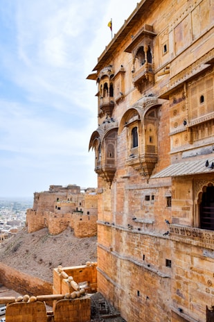 Intricate sandstone carvings on the walls of a historic fort in Jaisalmer.
