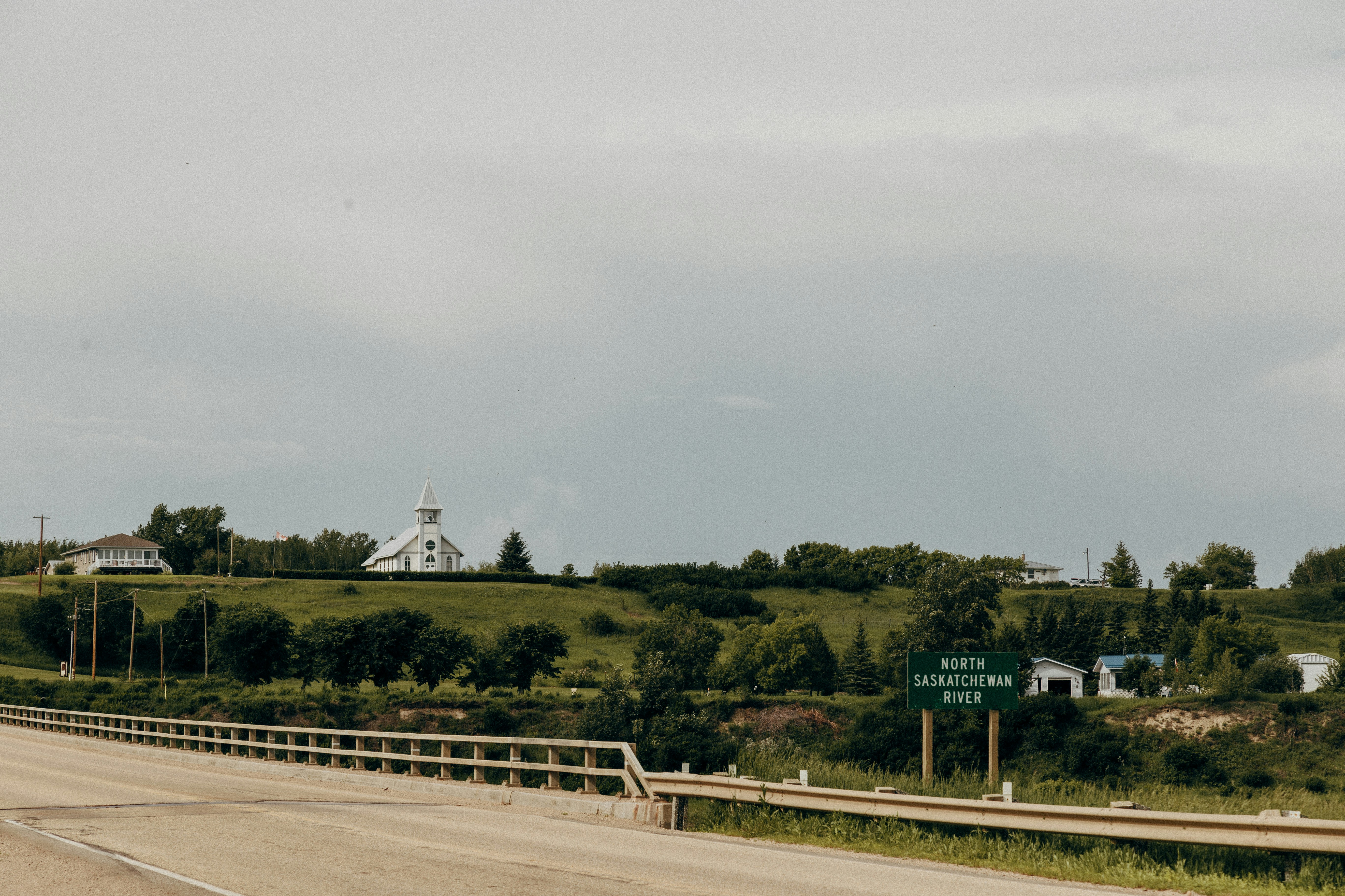 a road that has a sign on the side of it