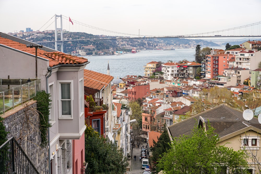 a view of a city with a bridge in the background