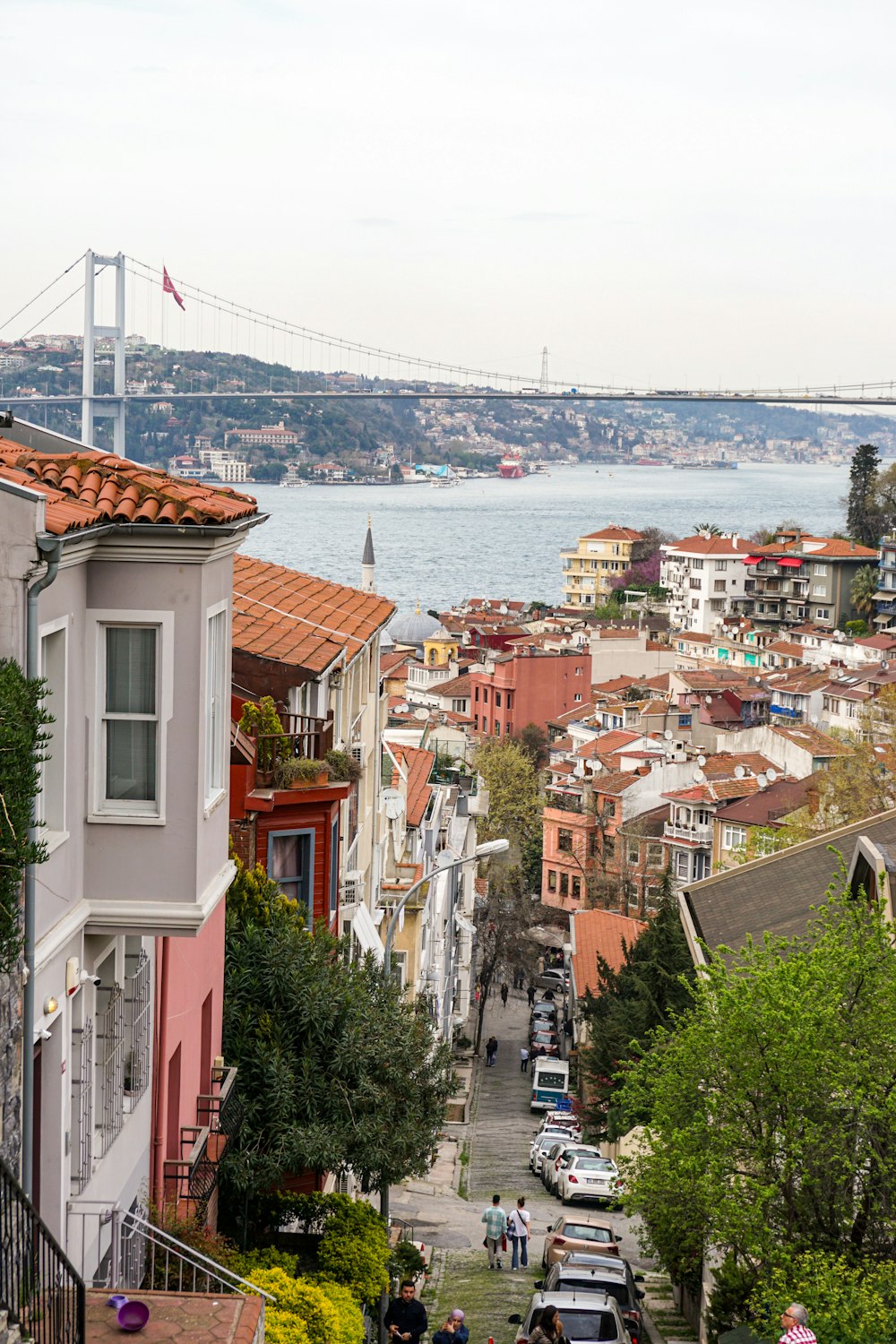 a view of a city with a bridge in the background