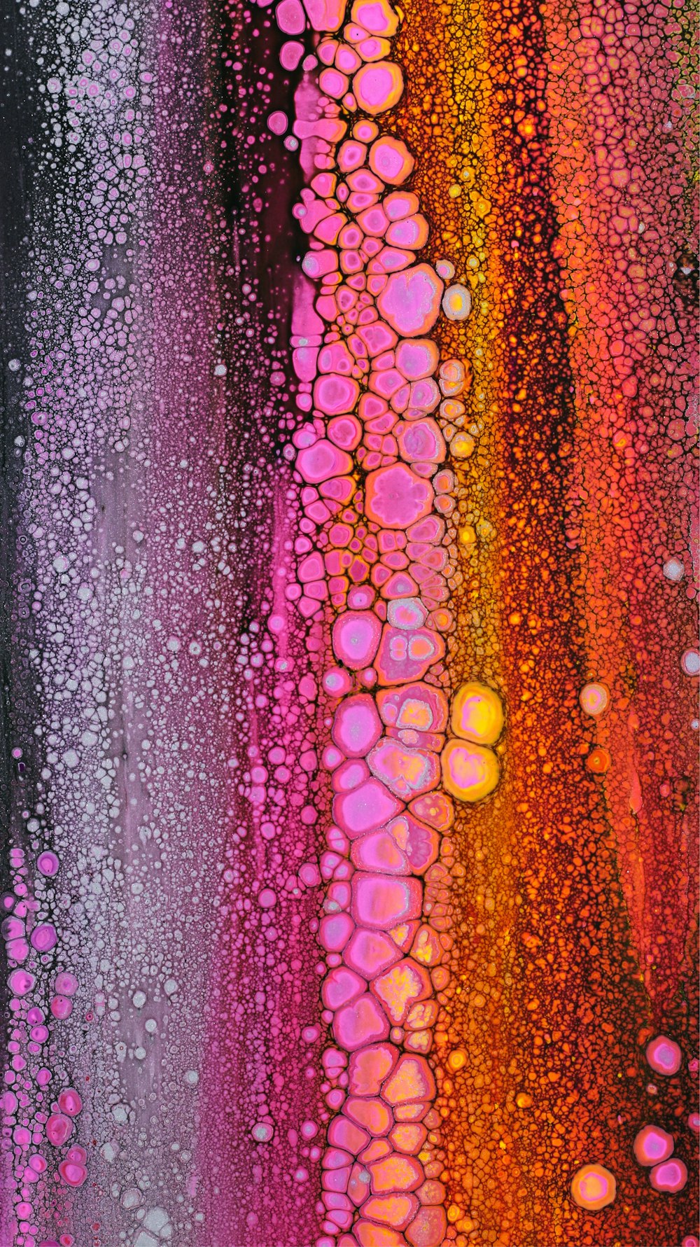 a close up of a painting with drops of water on it