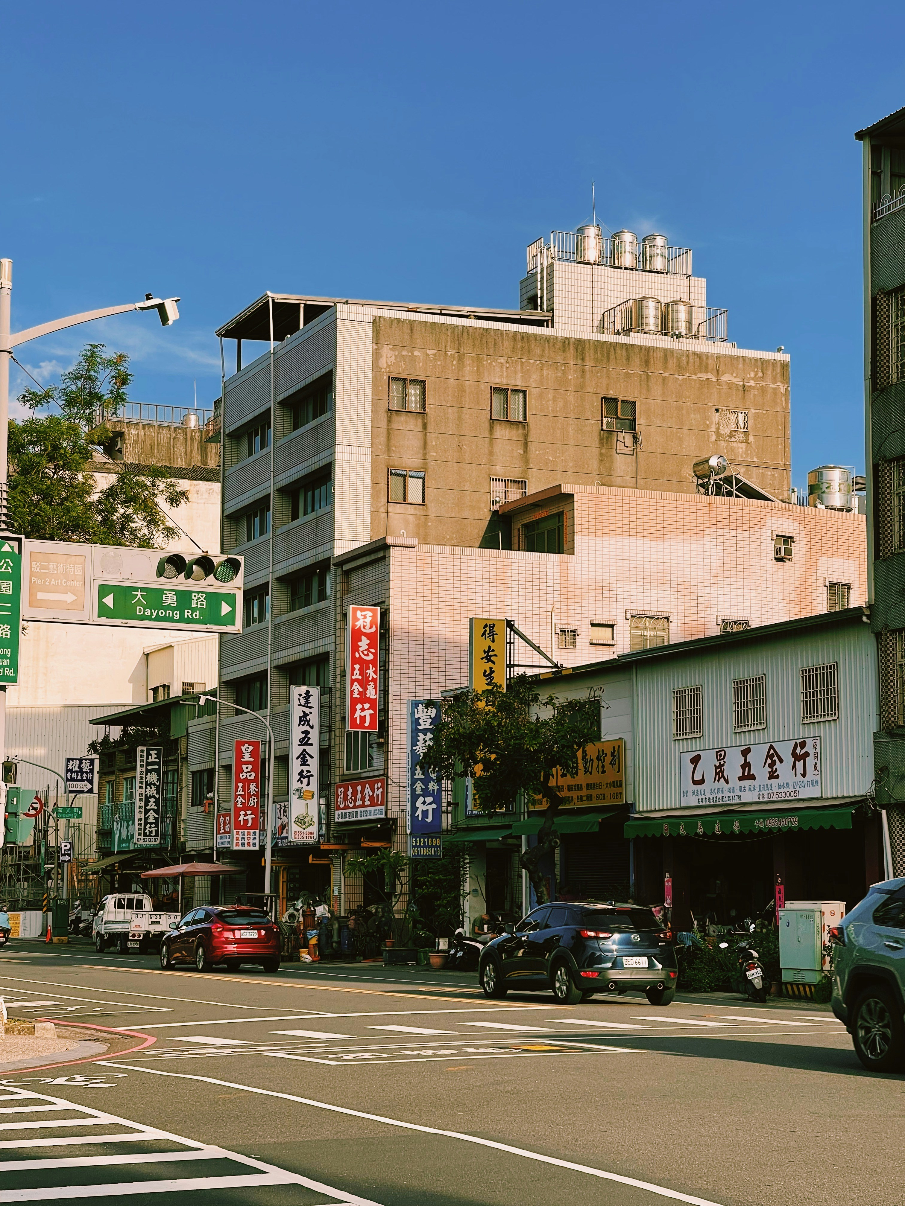 a city street filled with lots of tall buildings