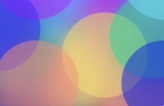 Creative pattern of overlapping circles in bright colors suggesting collaboration.