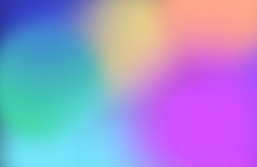A soft, colorful gradient blends smoothly from one hue to another, featuring shades of blue, green, yellow, purple, and pink.