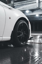 a white car parked in a parking garage