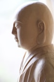An elegant wooden sculpture with a smooth finish.