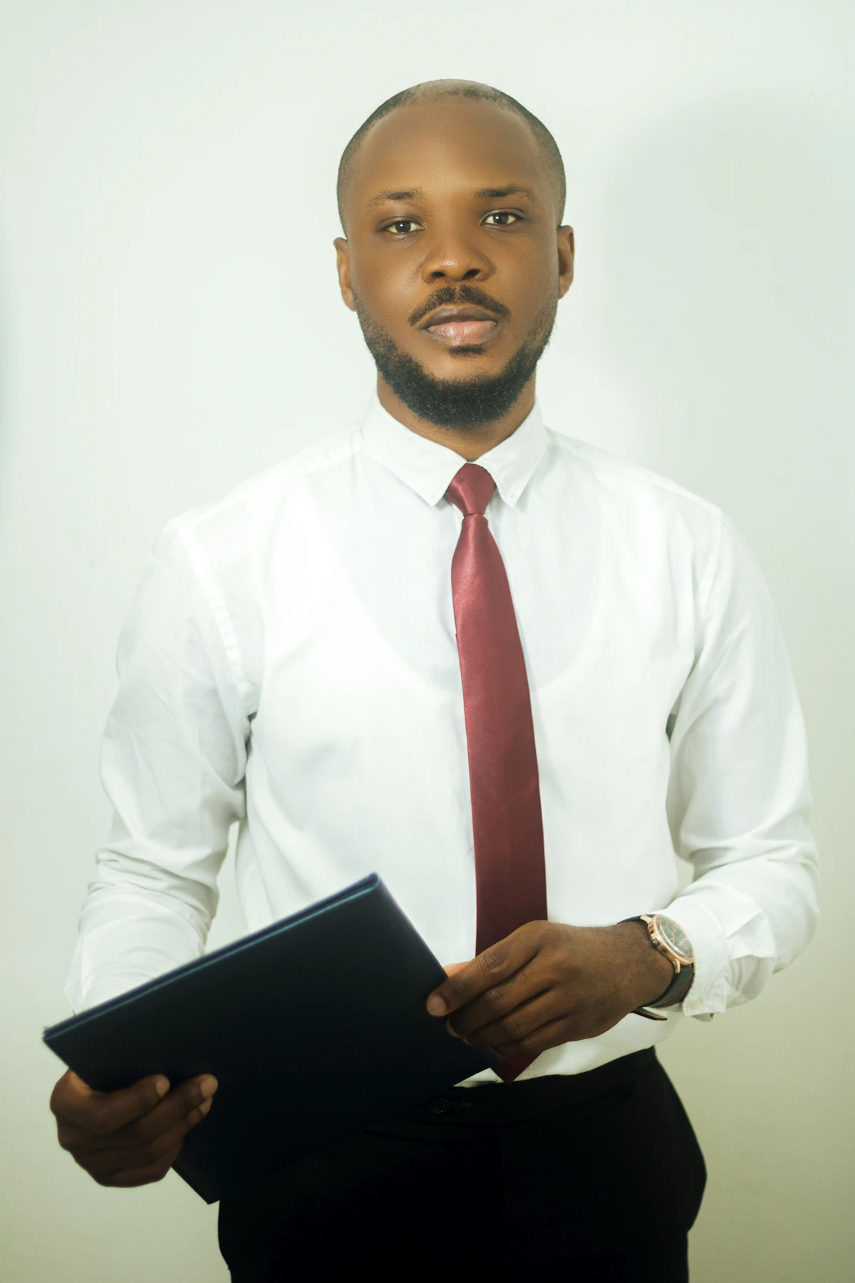 Black entrepreneur reviewing AI industry solutions for their East African company