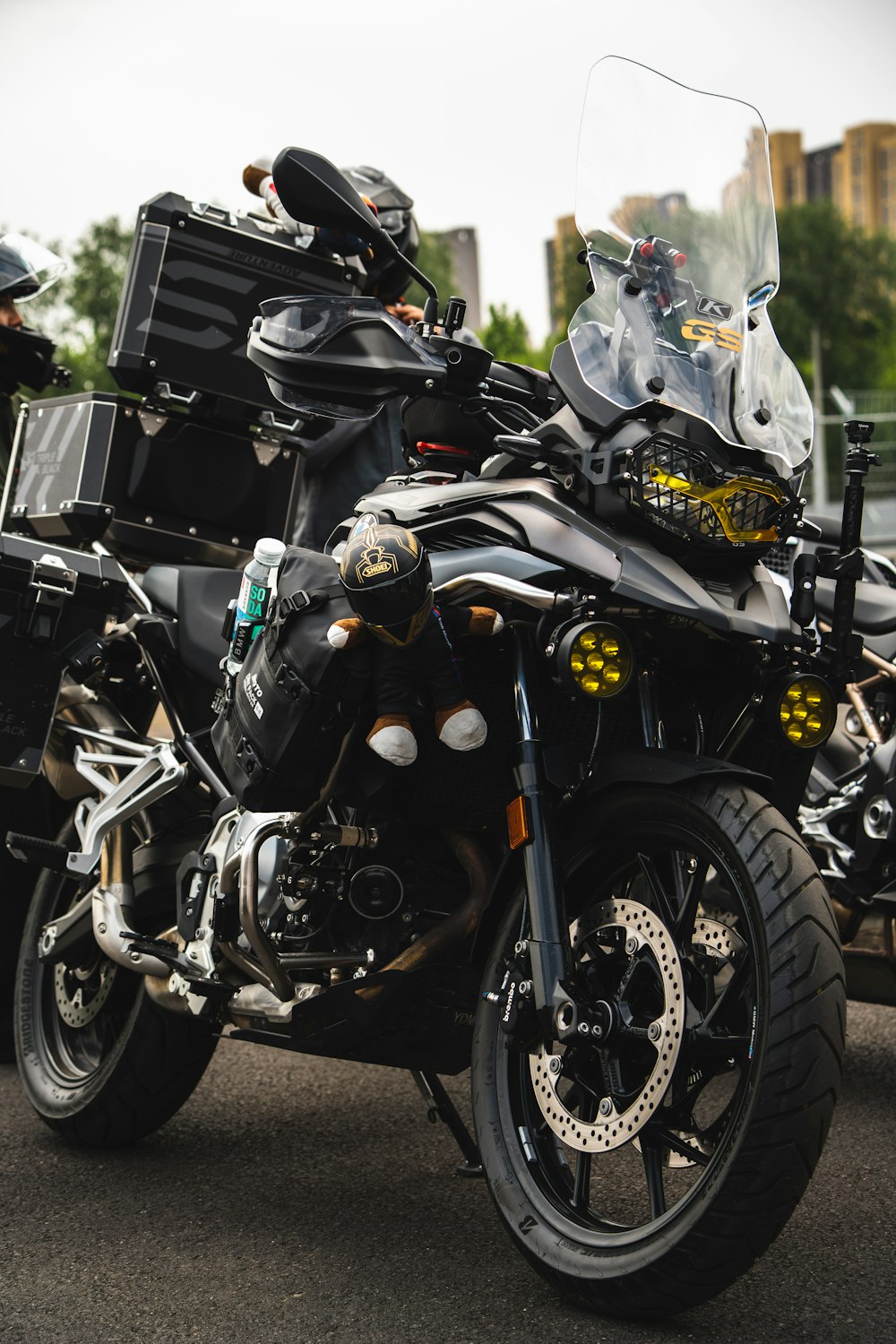 a black motorcycle parked on the side of the road