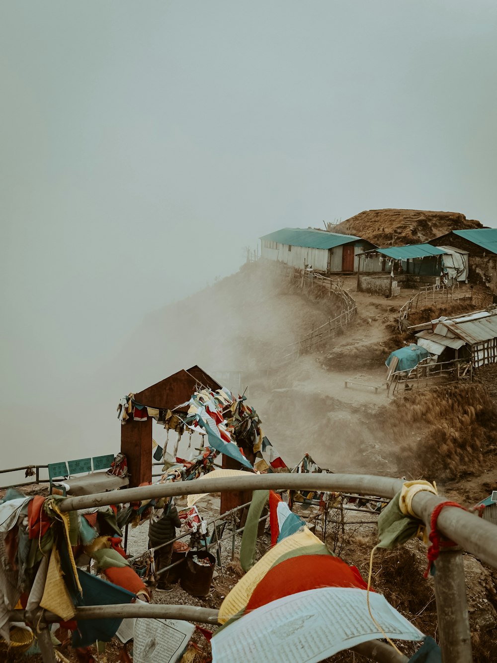 a group of tents sitting on top of a hill