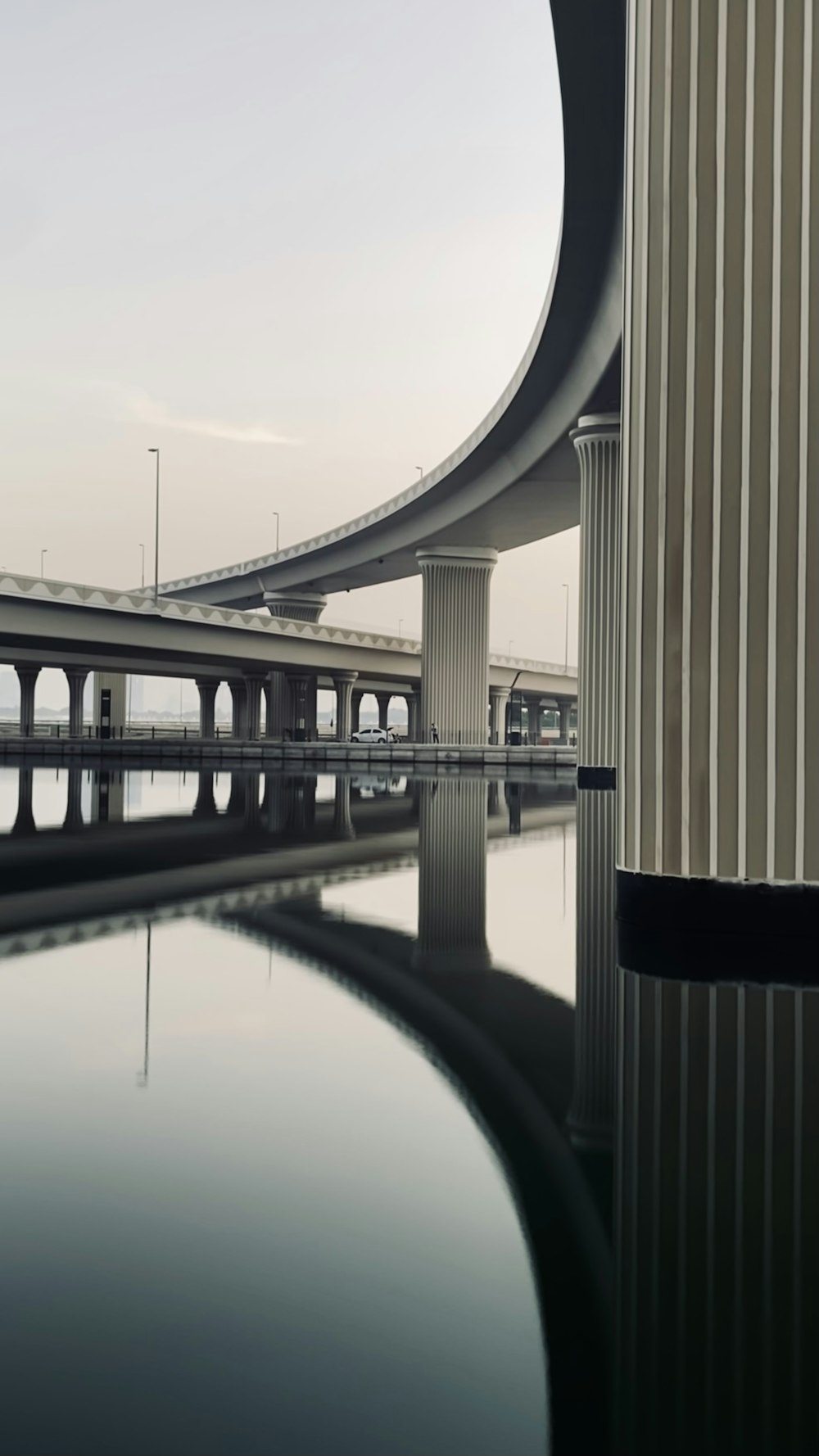 a view of a bridge over a body of water