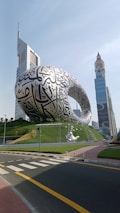 a giant turtle sculpture in front of a building