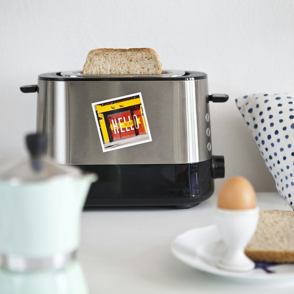 a toaster sitting on top of a white counter