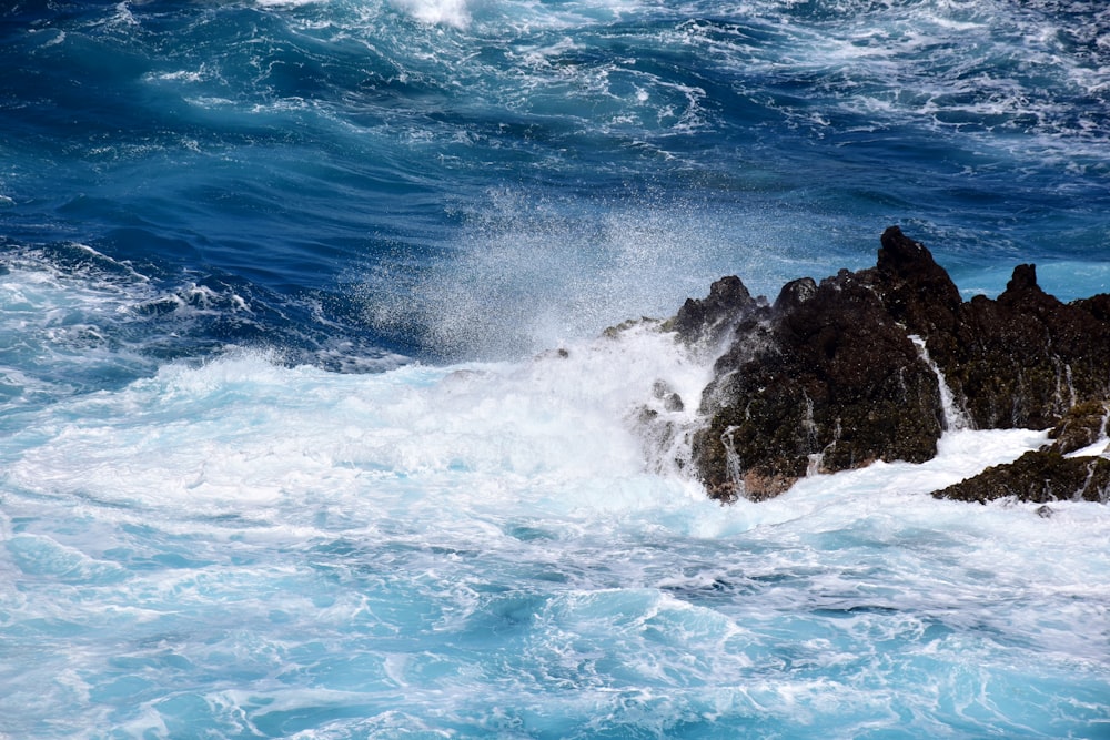 a large body of water surrounded by rocks