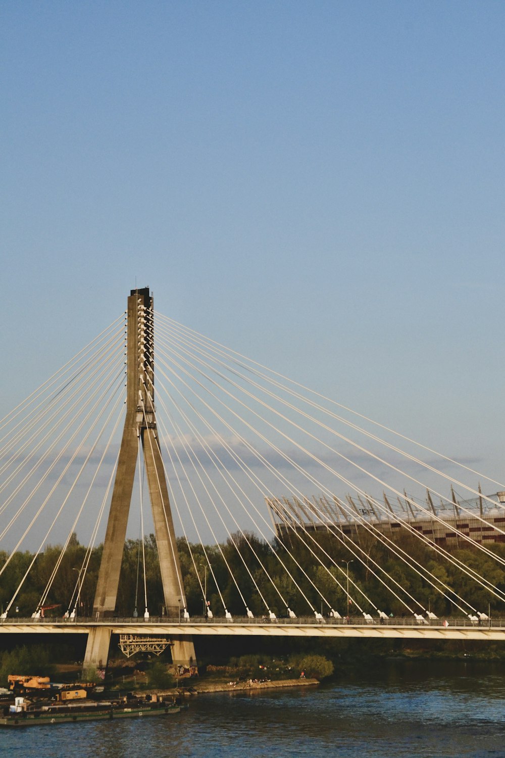 a very tall bridge over a body of water