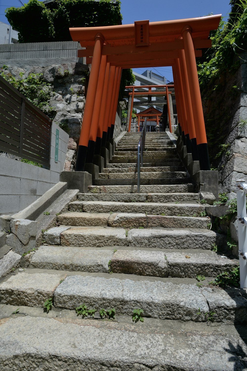 a set of stairs leading up to a shrine
