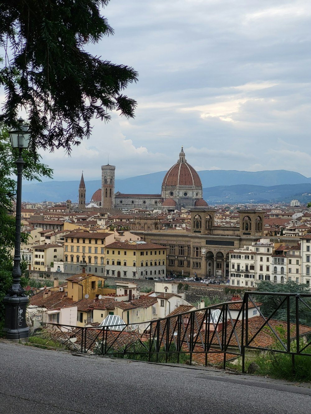 a view of a city from a hill