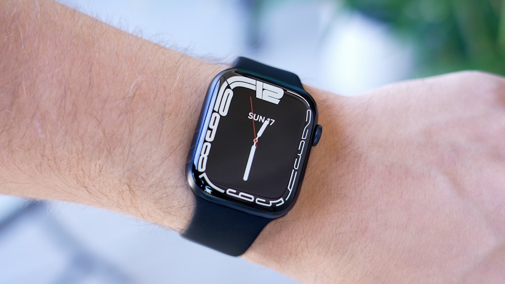 a close up of a person's wrist with a watch on it