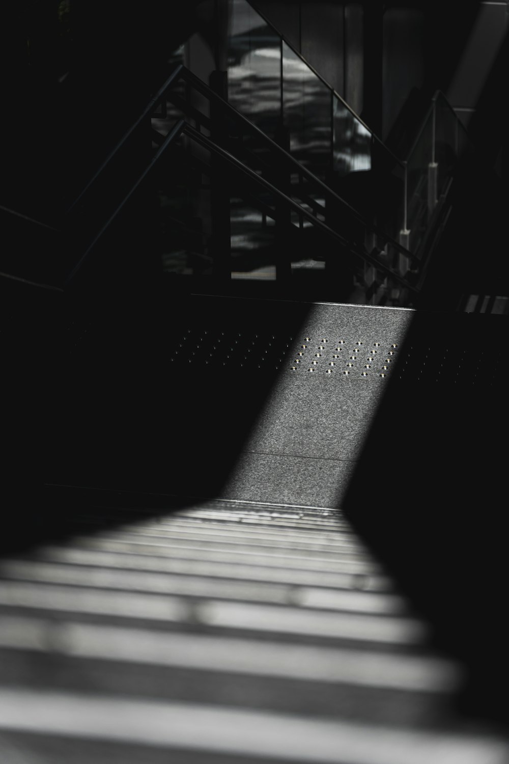 a black and white photo of a stairway