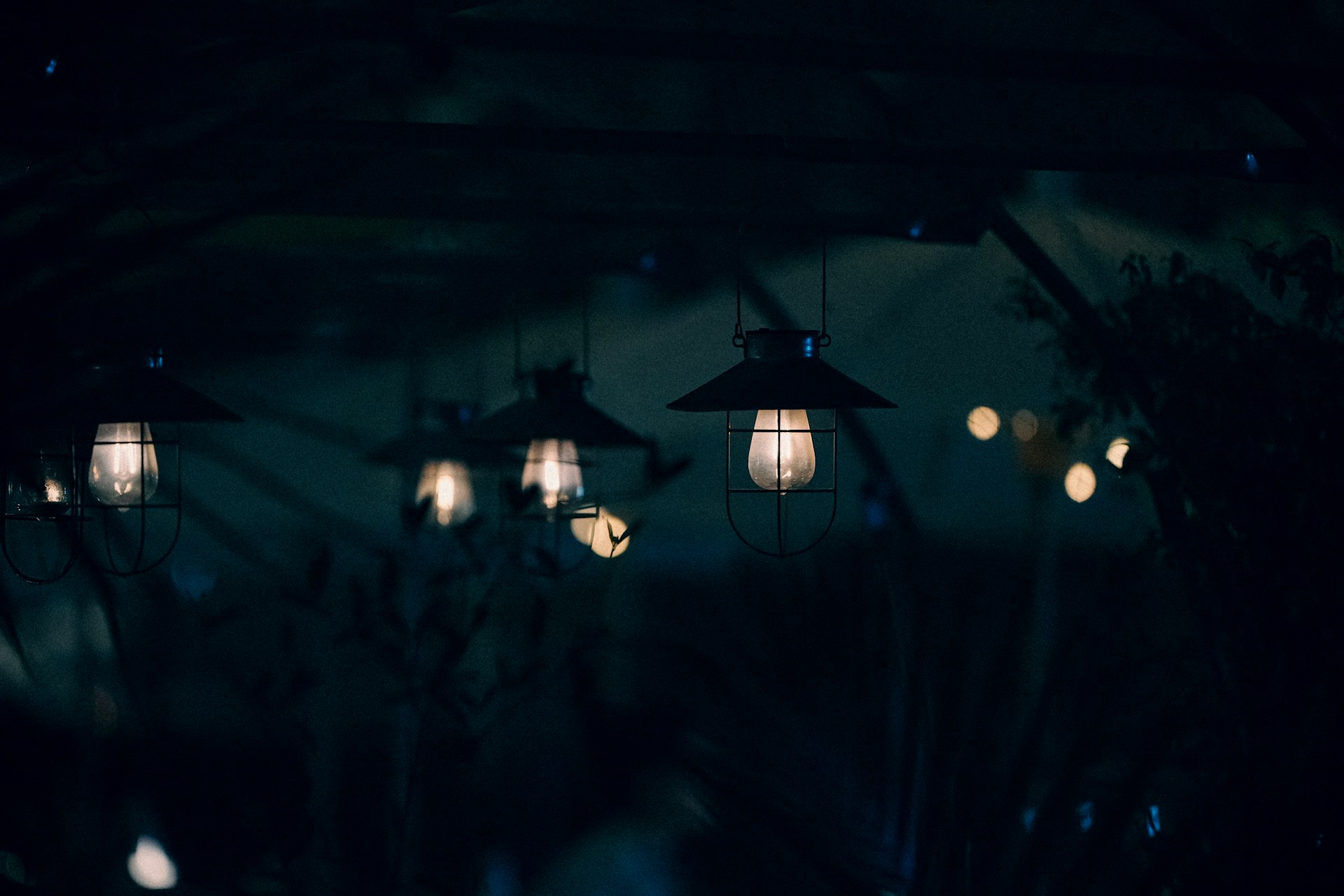a group of lights hanging from a ceiling