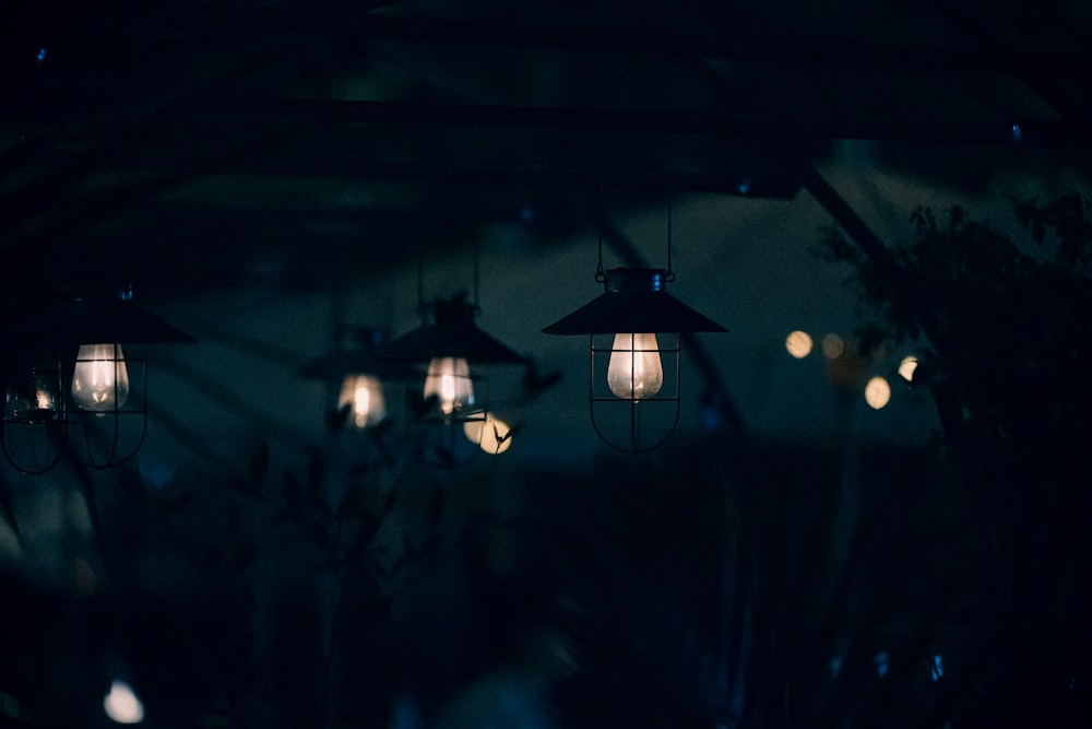 a group of lights hanging from a ceiling