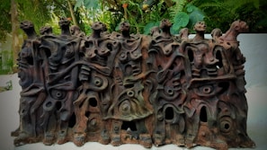 An outdoor exhibition featuring sculptures and visual art pieces celebrating Afro-Brazilian heritage.