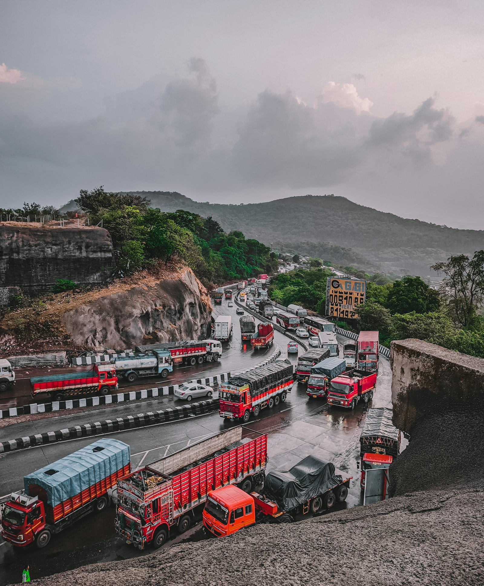 A fleet of logistics trucks parked together — the kind of frontline workforce Terraforce's fast-track verification model is designed for.
