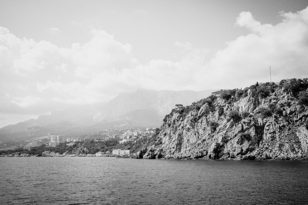 a black and white photo of a large body of water